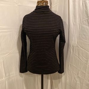 Black and gold turtle neck long sleeve shirt